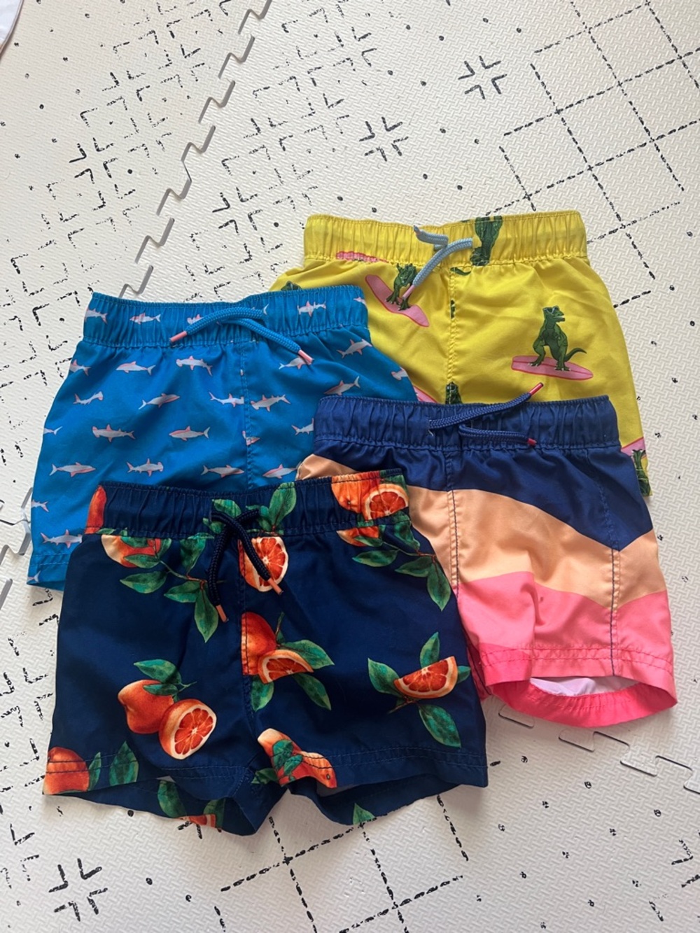 Four Old Navy boys swim trunks 18 month